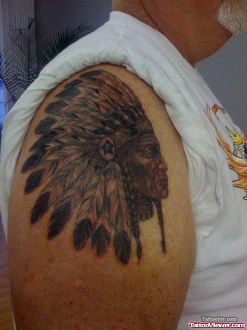 Grey Ink Native Head Tattoo On Shoulder