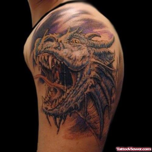 Realistic Dragon Head Tattoo On Man Left Shoulder