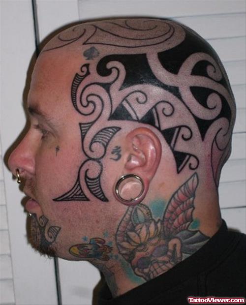 Nice Black Ink Tribal Head Tattoo For Men