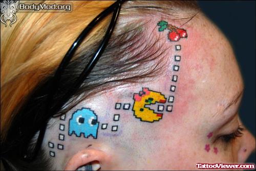 Attractive Colored Pacman Head Tattoo