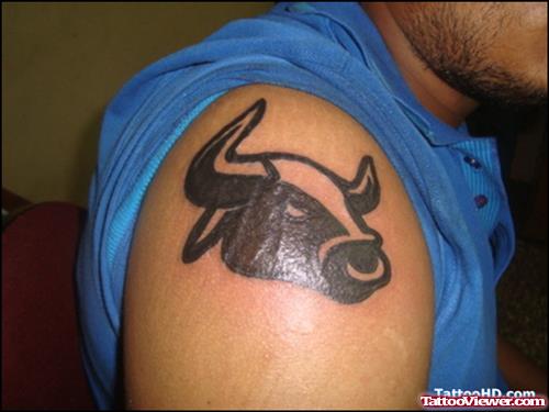 Black Ink Taurus Head Tattoo On Right Shoulder
