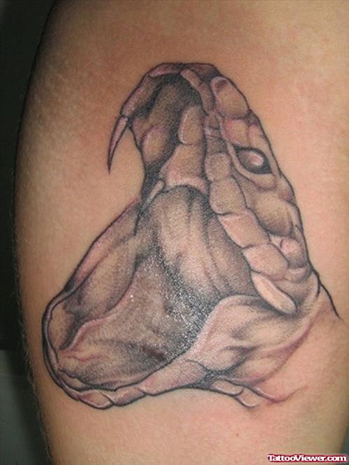 Grey Ink Snake Head Tattoo