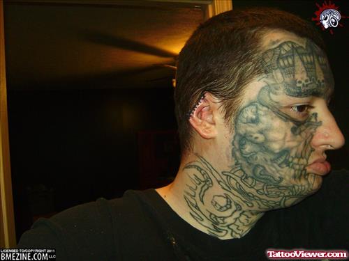 Grey Ink Head Tattoo