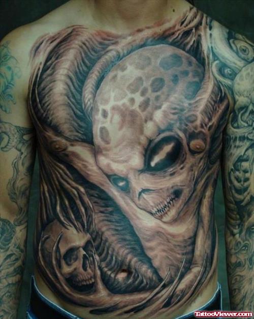 Grey Ink Alien Skull Head Tattoos On Body