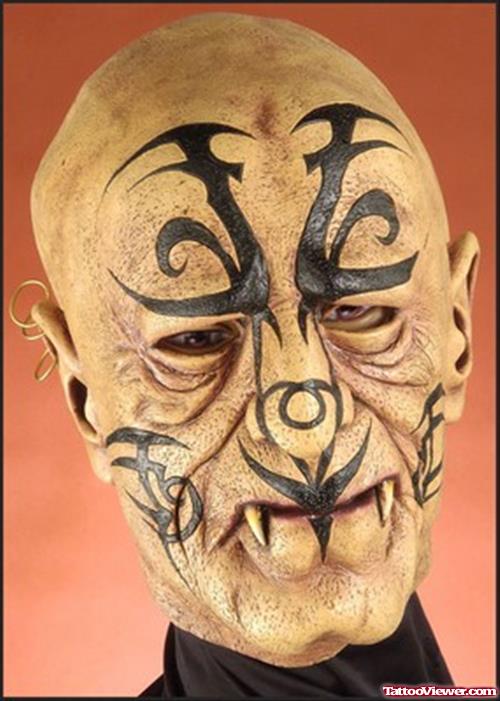 Black Tribal Head Tattoo