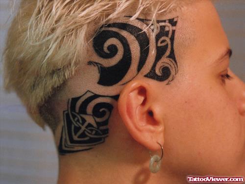 Black Tribal Head Tattoo On Side