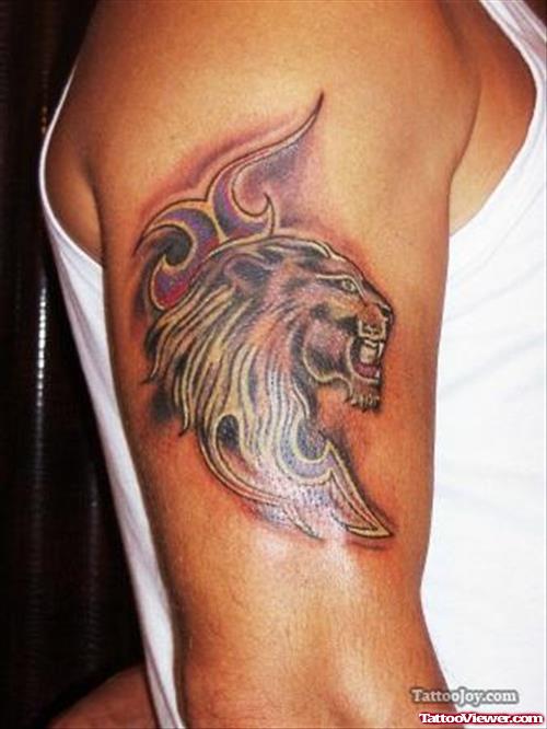 Tribal And Lion Head Tattoo On Right Half Sleeve