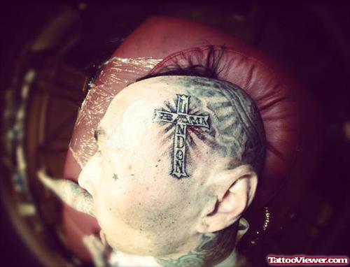 Man With Cross Head Tattoo
