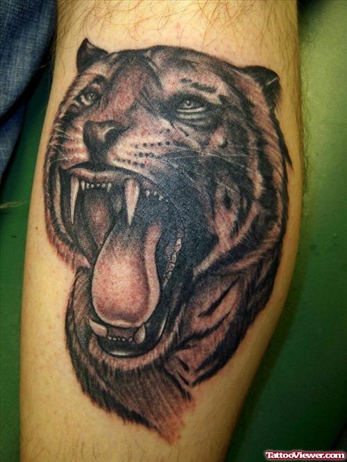 Amazing Grey Ink Tiger Head Tattoo On Leg