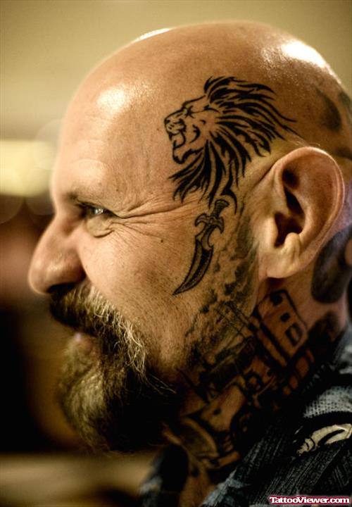 Tribal Lion Head Tattoo On Man Head