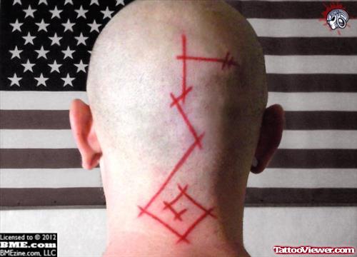 Red Ink Arrows Head Tattoo