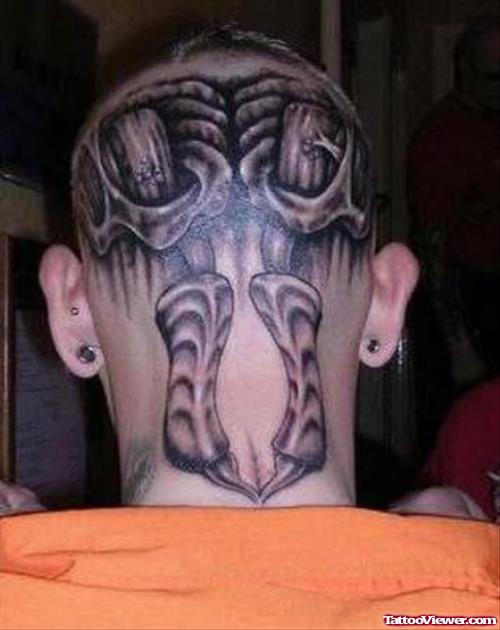 Awesome Grey Ink Skull Back Head Tattoo