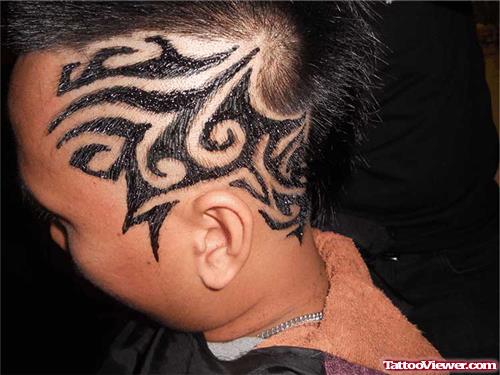 Amazing Black Ink Tribal Head Tattoo