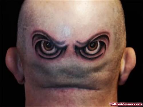 Angry Eyes Tattoo On Head
