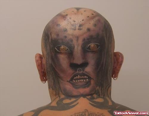 Alien Face Tattoo On Head