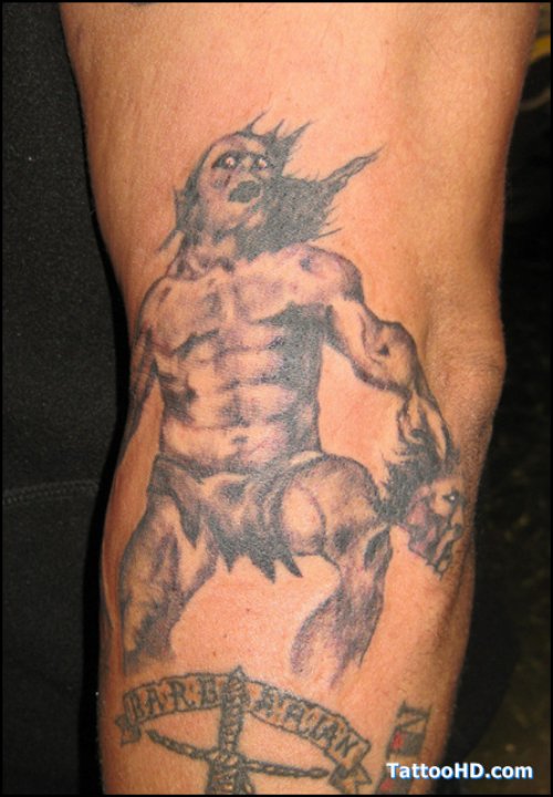Martial fighter Head Tattoo On Left Sleeve