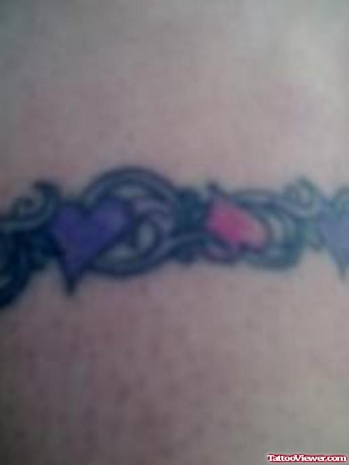 Purple And Red Hearts Tattoo