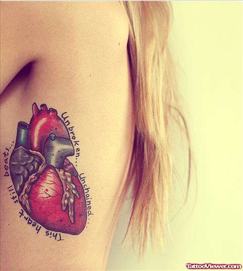 Real Heart Tattoo On Girl Side Rib