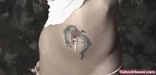 Dolphins And Heart Tattoo On Belly