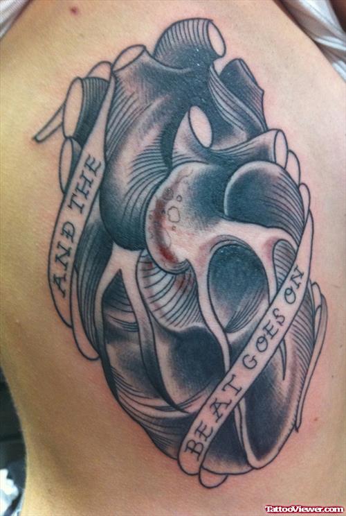 Amazing Grey Ink Heart Tattoo On Side Rib