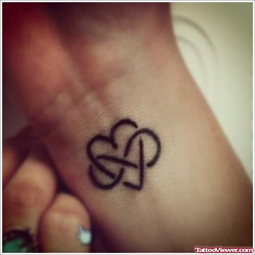 Infinity Symboil And Heart Tattoo On Wrist