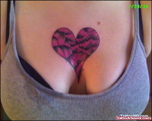 Heart Tattoo On Girl Chest