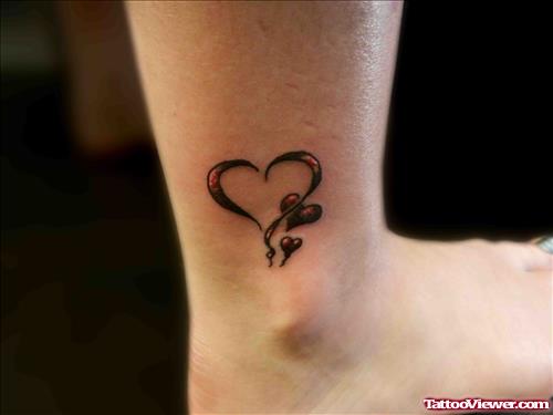 Grey Heart Tattoos On Ankle