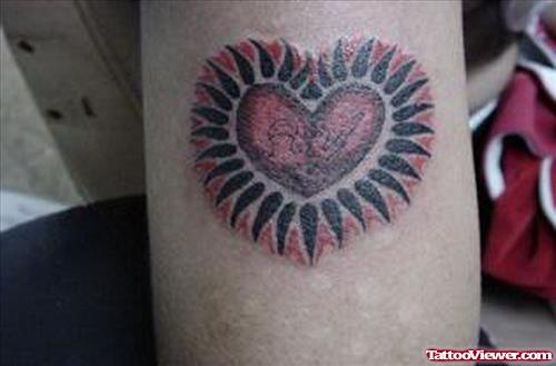 Charming Heart Tattoo On Bicep