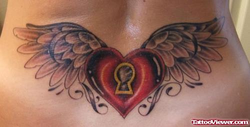 Winged Red Heart Tattoo On Lowerback