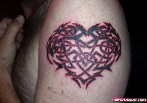 Tribal Heart Tattoo On Left Shoulder