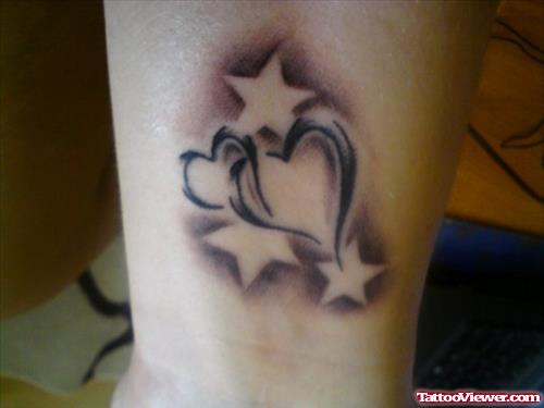 Grey Ink Stars and Heart Tattoo