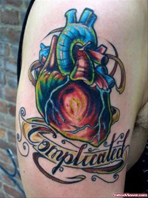 Complicated Banner and Human Heart Tattoo On Shoulder