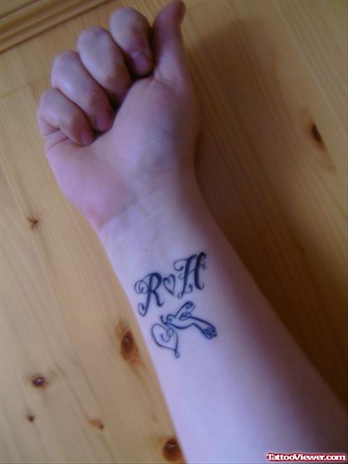 Roll Love Heart Tattoo On Wrist
