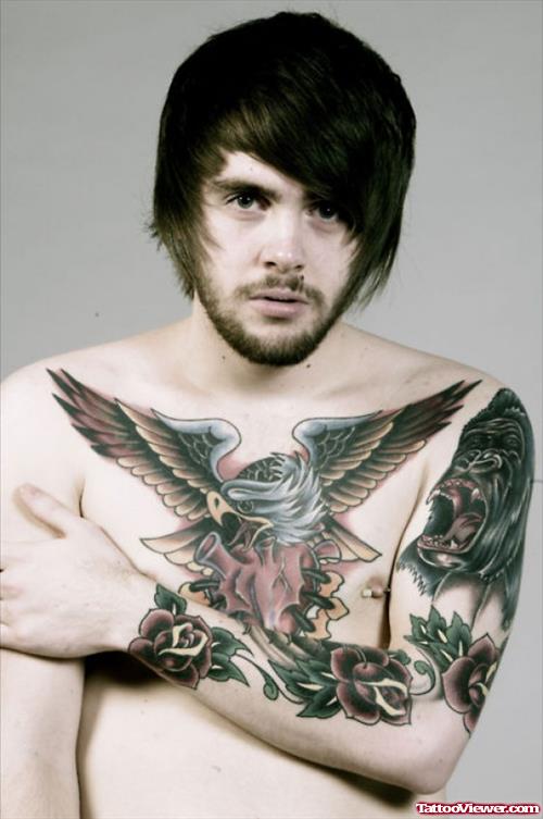 Flying Eagle And Human Heart Tattoo On Chest
