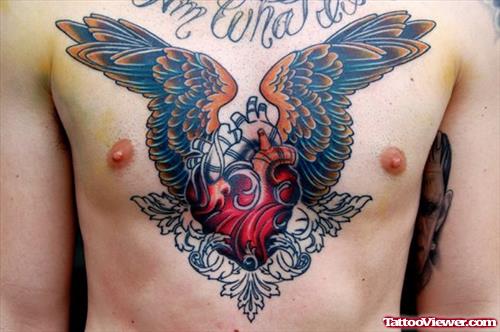 Winged Red Heart Tattoo On Man Chest