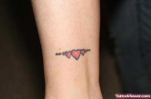 Tiny Red Hearts Heart Tattoo On Leg