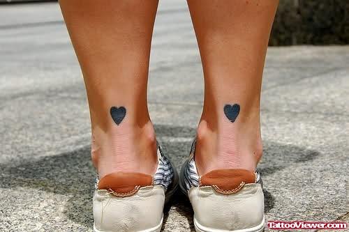 Black Ink Heart Tattoos On Back Legs