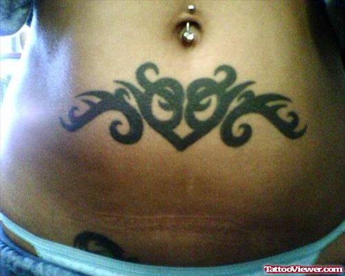 Tribal And Heart Tattoo On Belly