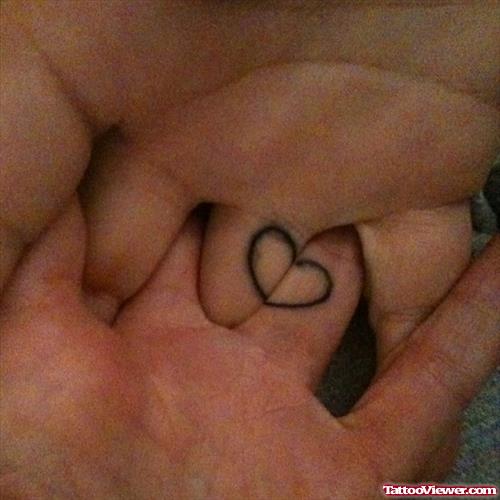 Tiny Heart Tattoo On Fingers