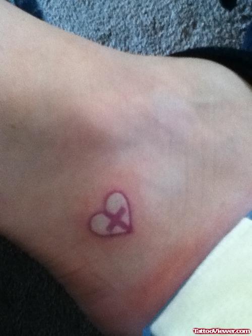 Tiny Heart And Cross Tattoo On Ankle