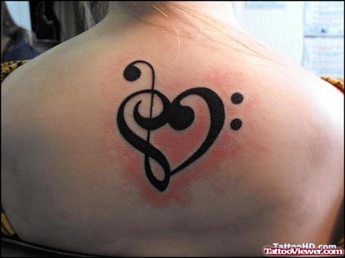 Musical Heart Tattoo On Upperback