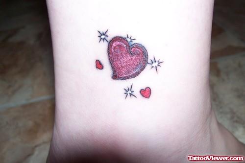 Awesome Red Heart Tattoo On Wrist