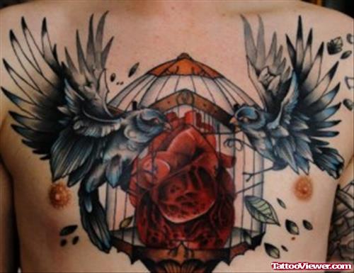 Flying Birds From Cage And Human Heart Tattoo On Chest