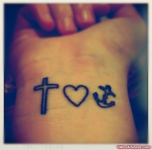 Cross And Anchor With Heart Tattoo On Wrist