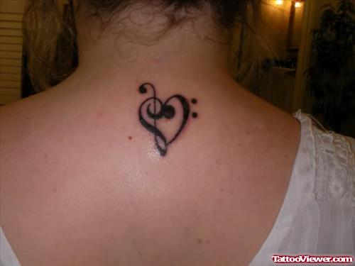 Black Heart Tattoo On Upperback