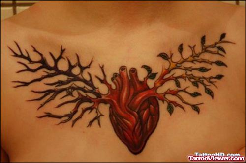 Nice Heart Tattoo On Man Chest