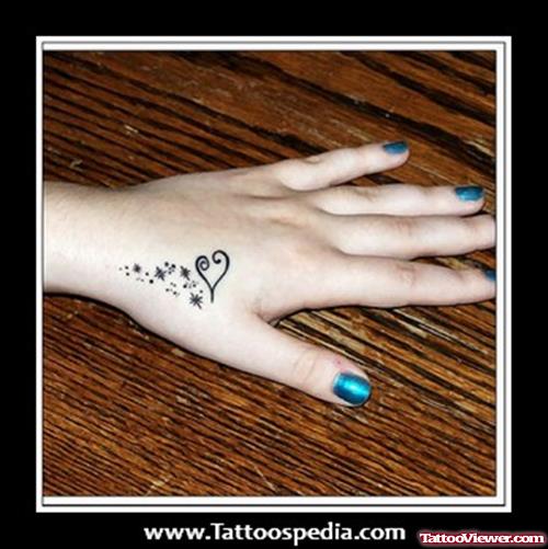 Heart Tattoo On Girl Left Hand