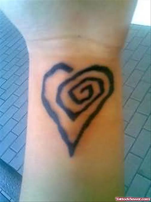 Elegant Spiral Heart Tattoo On Wrist