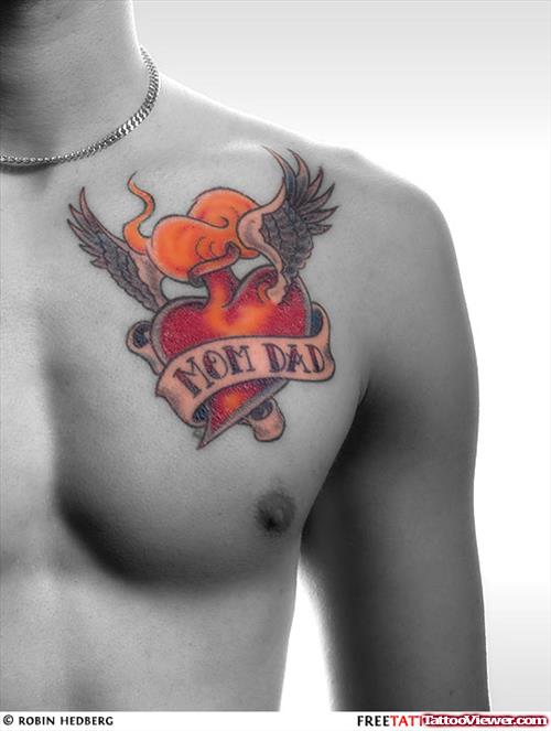 Winged Sacred Heart Tattoo On Man Chest