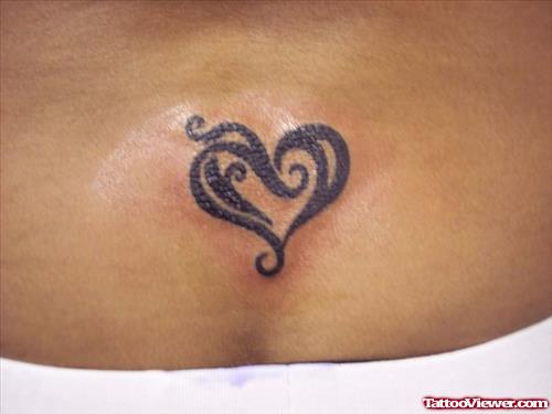Black Tribal Heart Tattoo on Chest